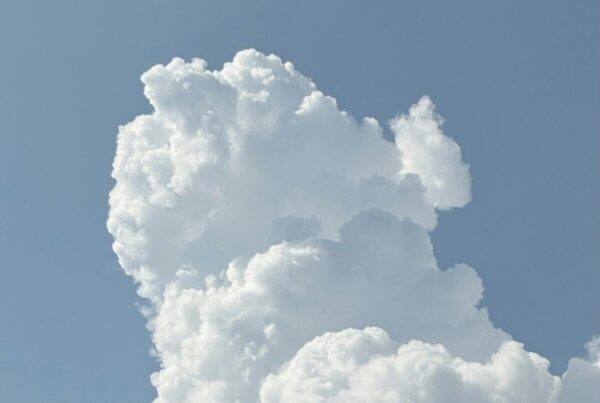 Fluffy cloud against a beautiful blue sky.